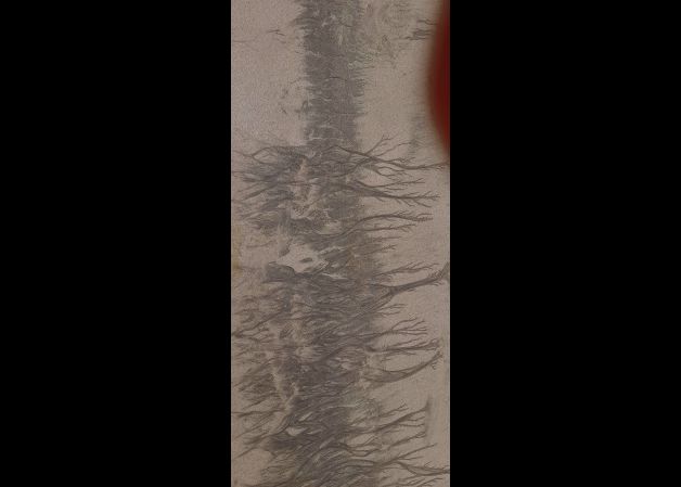 Arte en la arena de la playa.